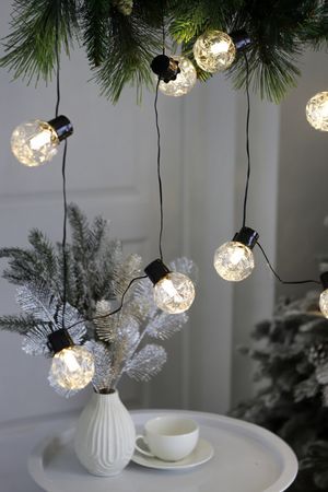 Светодиодная гирлянда из лампочек КАЛЬДО КОНФОРТО, 20 тёплых белых LED-огней, 6+3 м, чёрный ПВХ, IP44, 