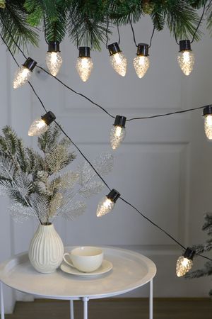 Светодиодная гирлянда из лампочек ШИШКИ ГЬЯЧЧОЛИ, 20 тёплых белых LED-огней, 6+3 м, чёрный ПВХ, IP44, 